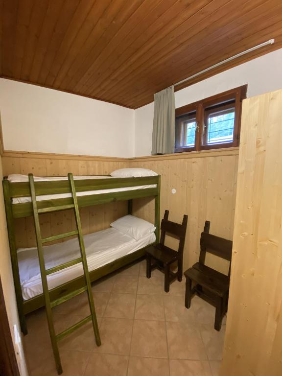 Postel nebo postele na pokoji v ubytování Appartamenti Sorapiss