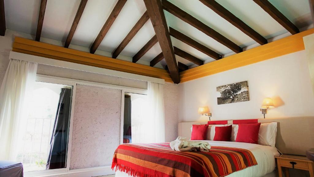 Postel nebo postele na pokoji v ubytování Casona Granado
