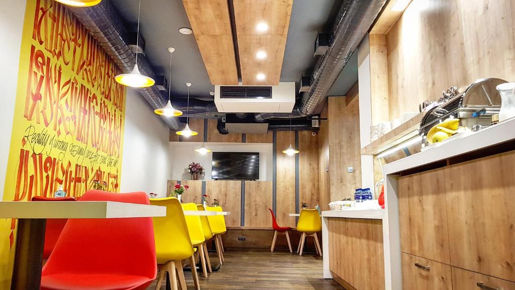 Kuchyň nebo kuchyňský kout v ubytování Hotel Alpha