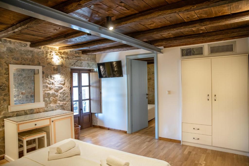 Postel nebo postele na pokoji v ubytování Trapela Areopolis, Boutique Hotel