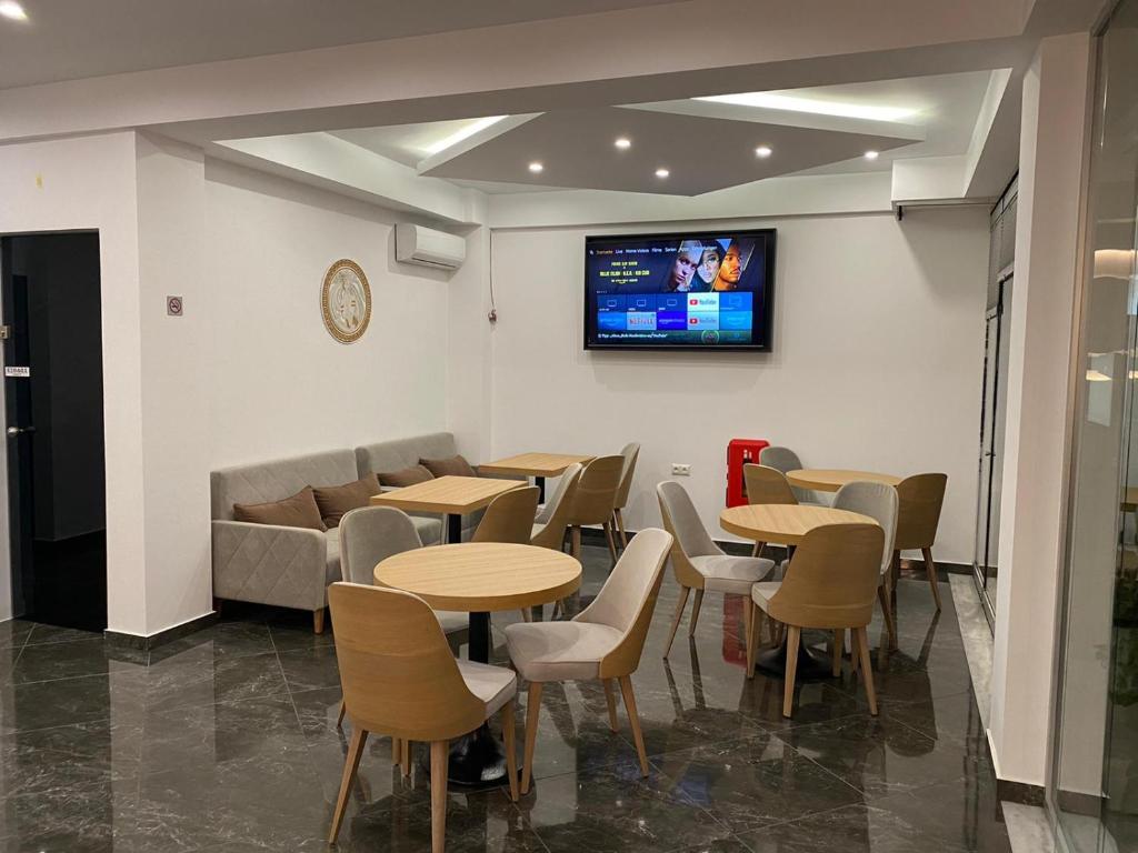 TV a/nebo společenská místnost v ubytování Hotel Medusa