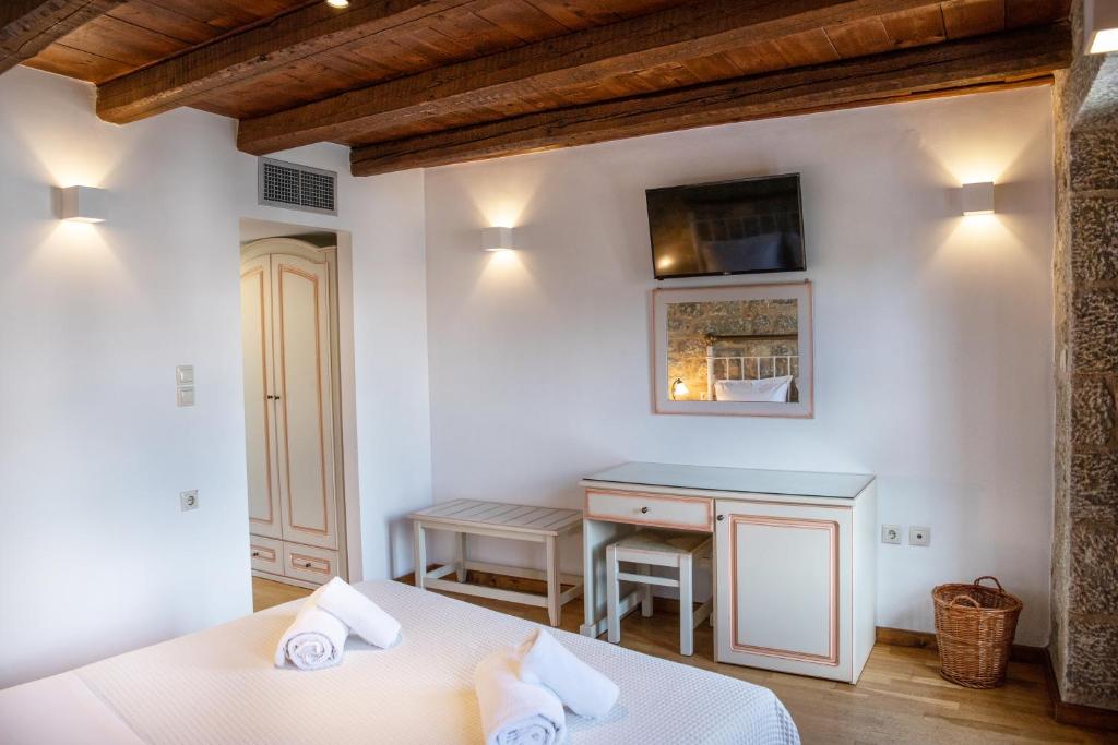 Postel nebo postele na pokoji v ubytování Trapela Areopolis, Boutique Hotel