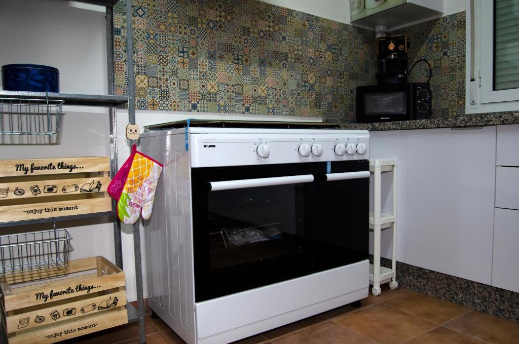 Kuchyň nebo kuchyňský kout v ubytování Zapata Home