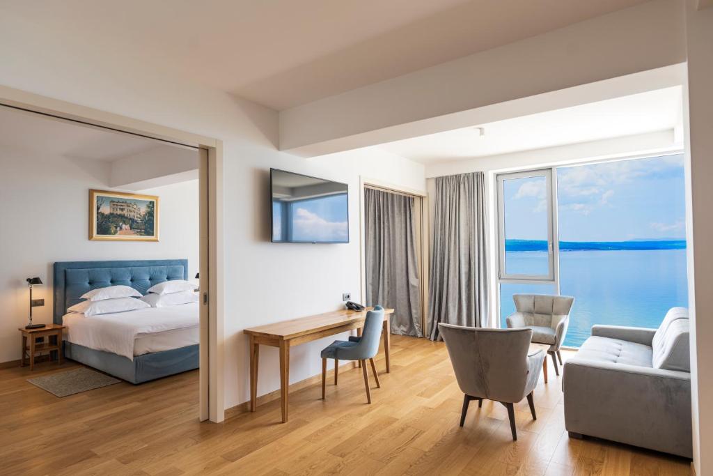 Postel nebo postele na pokoji v ubytování Hotel Miramare