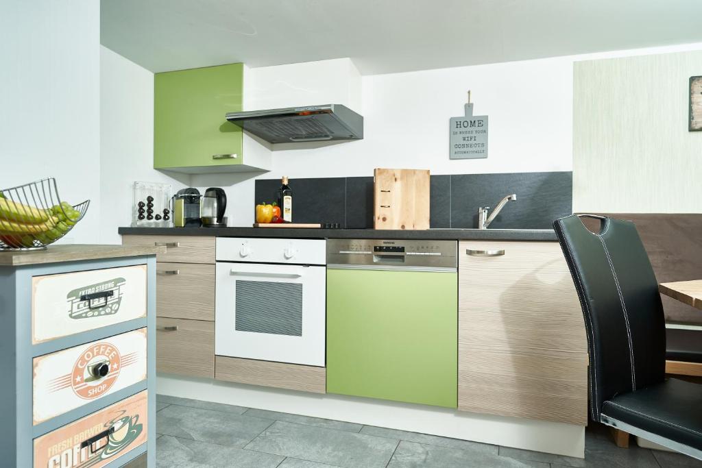 Kuchyň nebo kuchyňský kout v ubytování Freestyle Apartment