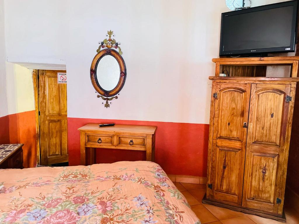 TV a/nebo společenská místnost v ubytování Casa de Pita