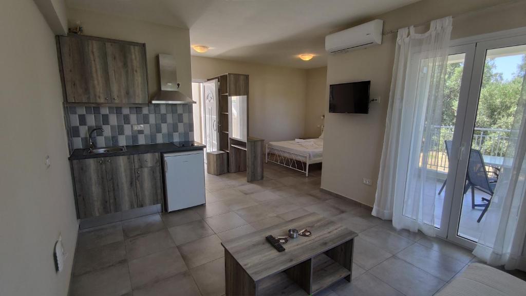 Kuchyň nebo kuchyňský kout v ubytování Casa De Rosa Apartments & Studios