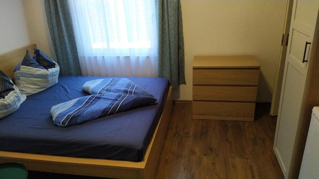 Łóżko lub łóżka w pokoju w obiekcie VilLa AdeLe