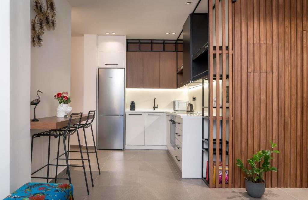 Kuchyňa alebo kuchynka v ubytovaní Glyfada Gallery Apartment