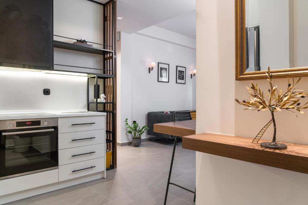 Kuchyňa alebo kuchynka v ubytovaní Glyfada Gallery Apartment