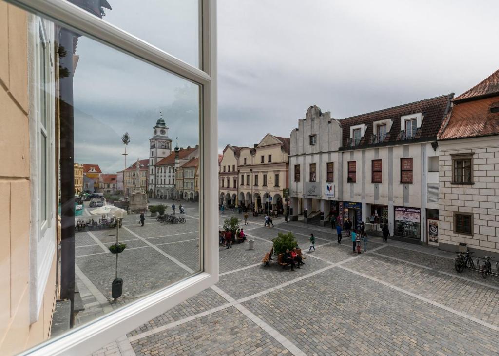 a view of a city street from a window at Vratislavsky Dum in Třeboň
