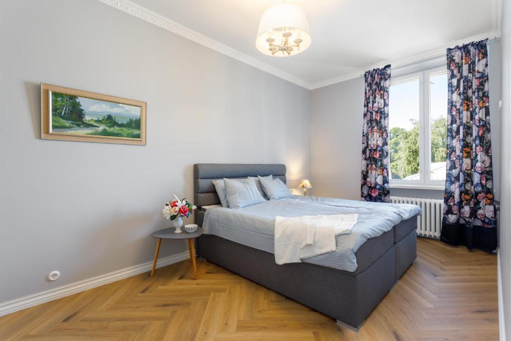 Postel nebo postele na pokoji v ubytování Pärnu Rüütli Apartments