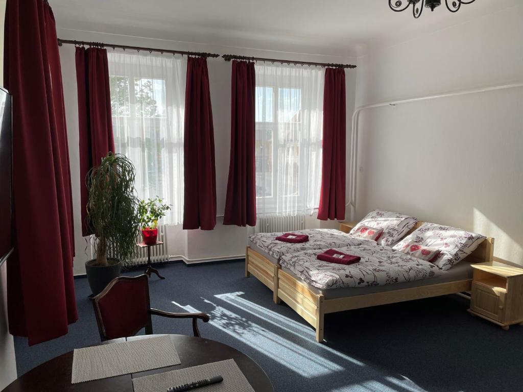 Ένα ή περισσότερα κρεβάτια σε δωμάτιο στο Apartmán Netolice 207 Deluxe