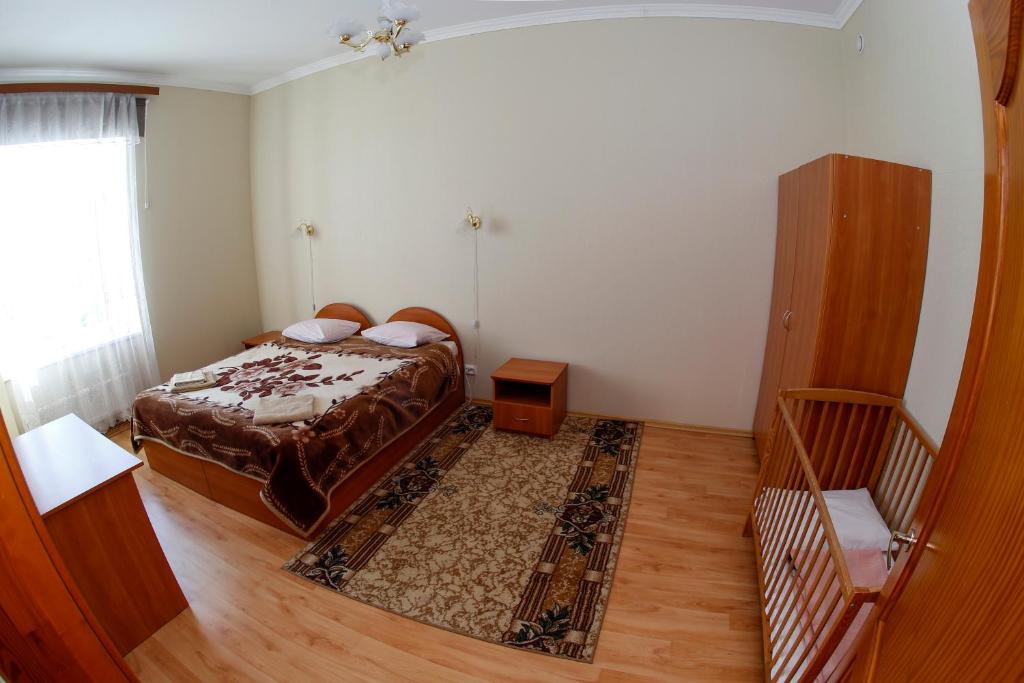 Postel nebo postele na pokoji v ubytování Lucia