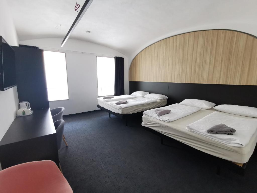 Postel nebo postele na pokoji v ubytování Cha Cha Rooms