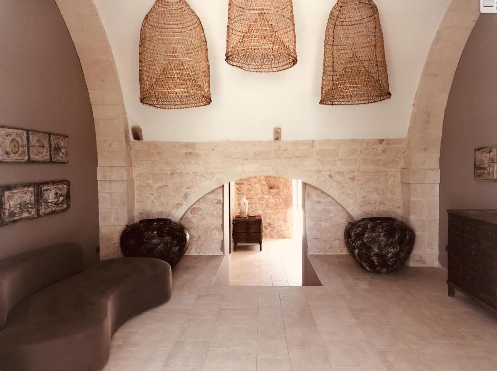 אזור ישיבה ב-Pietra d'Acqua Resort & Spa by Geocharme