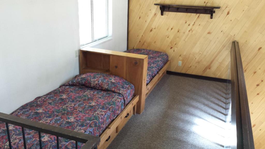 Postel nebo postele na pokoji v ubytování Club Tahoe Resort