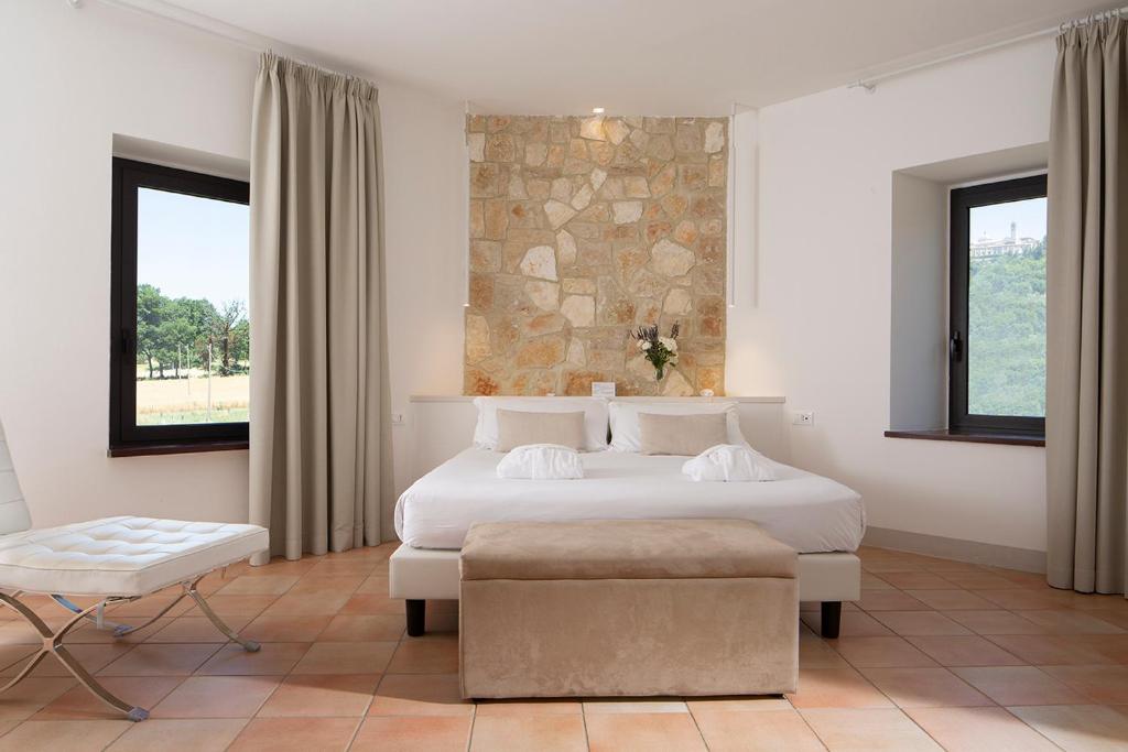Posteľ alebo postele v izbe v ubytovaní Giotto Country House & Spa