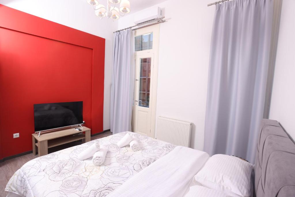 Posteľ alebo postele v izbe v ubytovaní OPL Executive Apartment