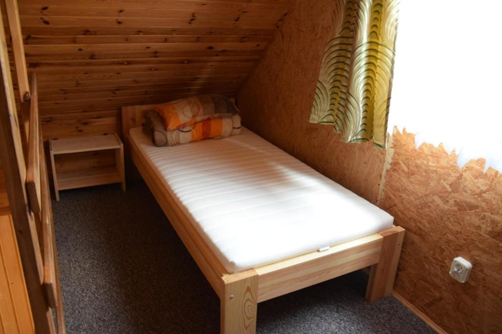Postel nebo postele na pokoji v ubytování Ośrodek Wypoczynkowy Babiński