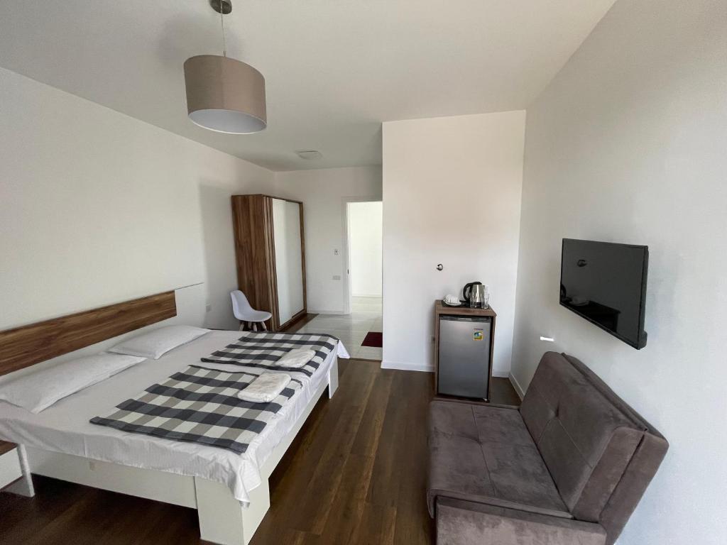 TV a/nebo společenská místnost v ubytování Eco House