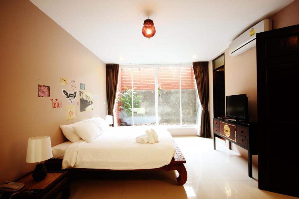 Feung Nakorn Balcony Rooms and Cafe - Resim 43