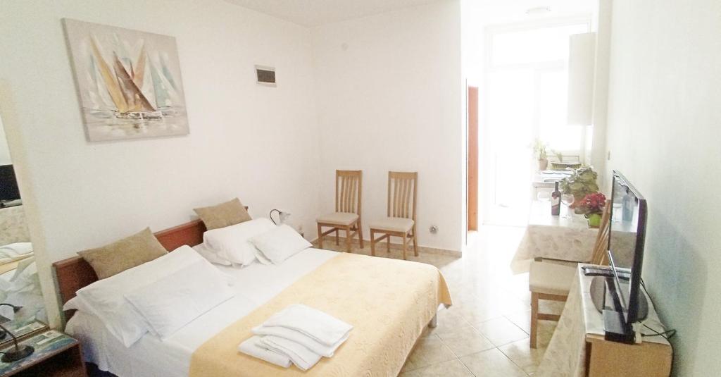 Letto o letti in una camera di AVA Studio apartment and Room
