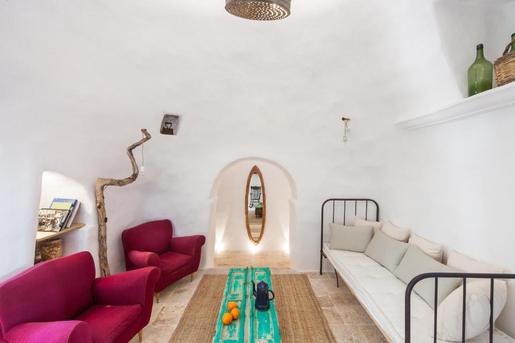 Posedenie v ubytovaní Trulli 18cinquantanove