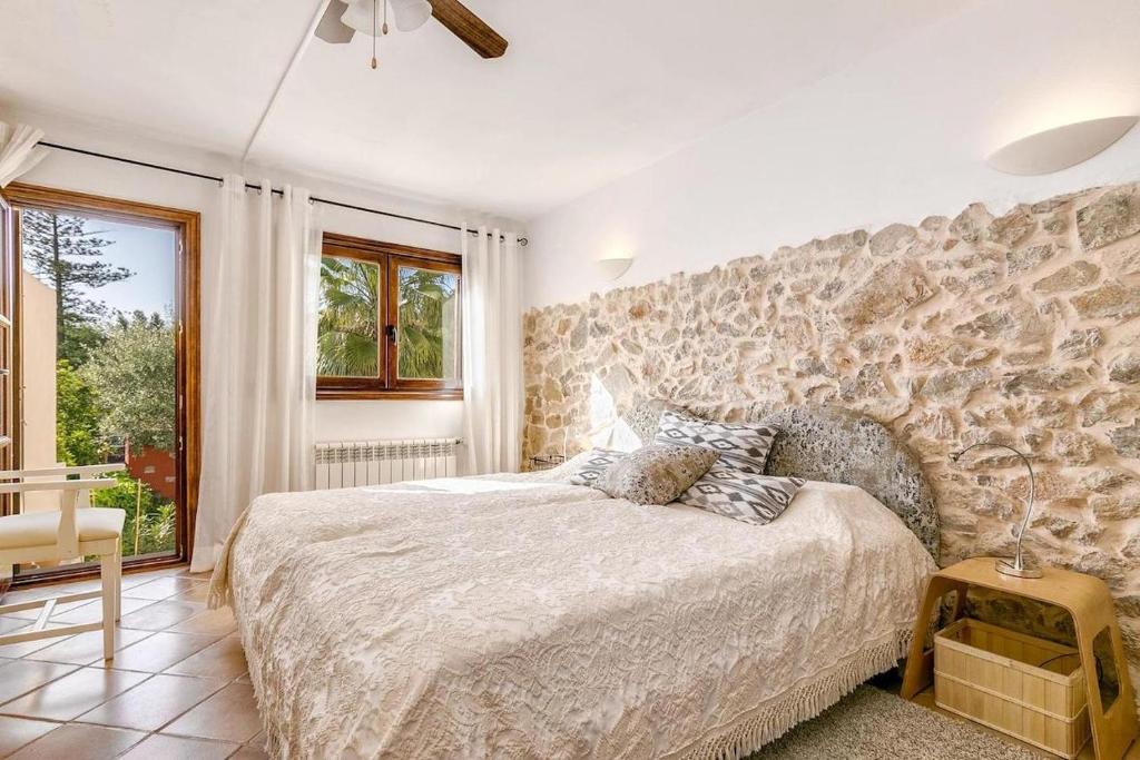 A bed or beds in a room at Casa Maria Angela