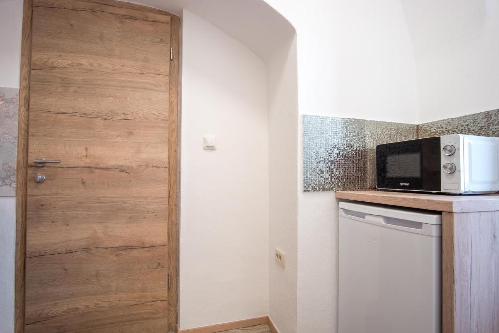 Kuchyň nebo kuchyňský kout v ubytování Vila Radolca apartments & rooms