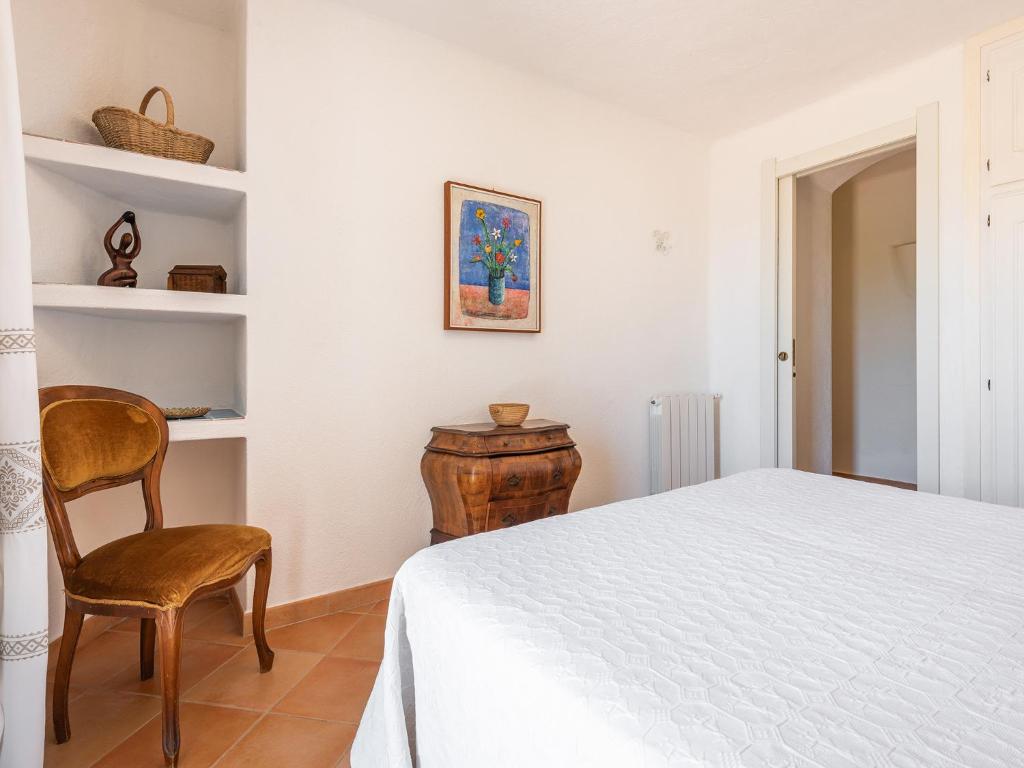 Postel nebo postele na pokoji v ubytování Relais Baia di Nelson