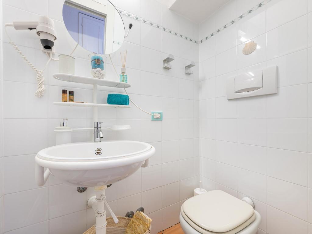 Koupelna v ubytování Relais Baia di Nelson