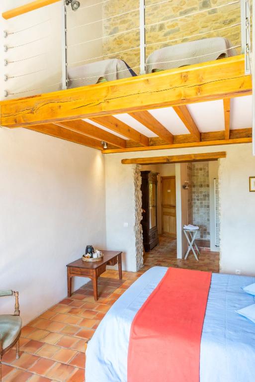 Postel nebo postele na pokoji v ubytování Maison d'Hôtes Mas de la Chadenede