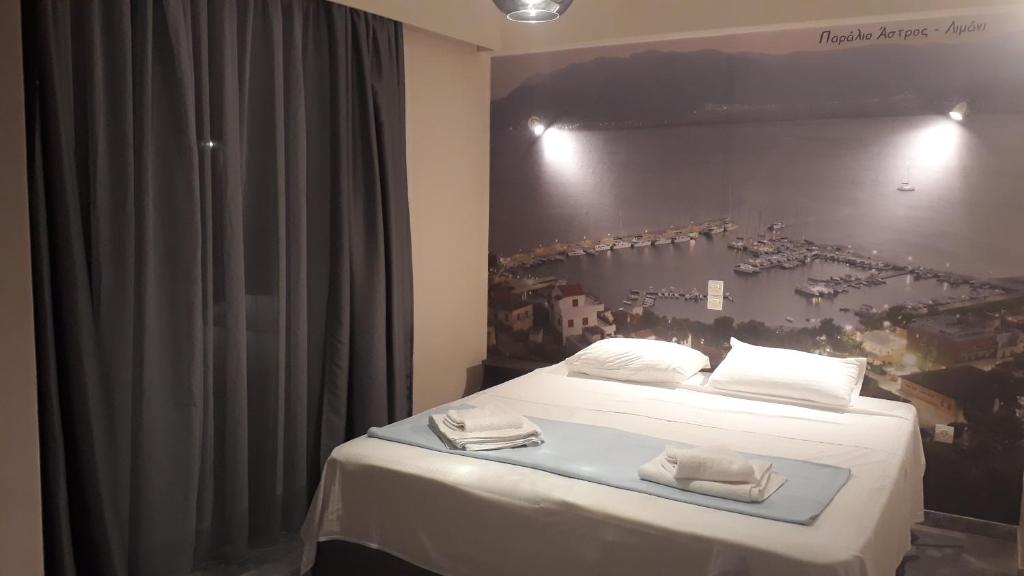 Postel nebo postele na pokoji v ubytování Enalion Beach Hotel