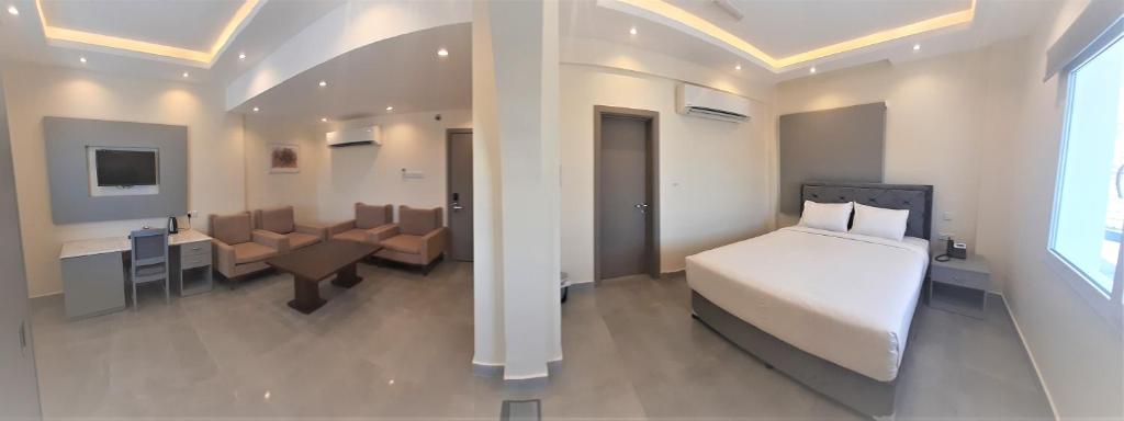 Postel nebo postele na pokoji v ubytování NASEEM HOTEL