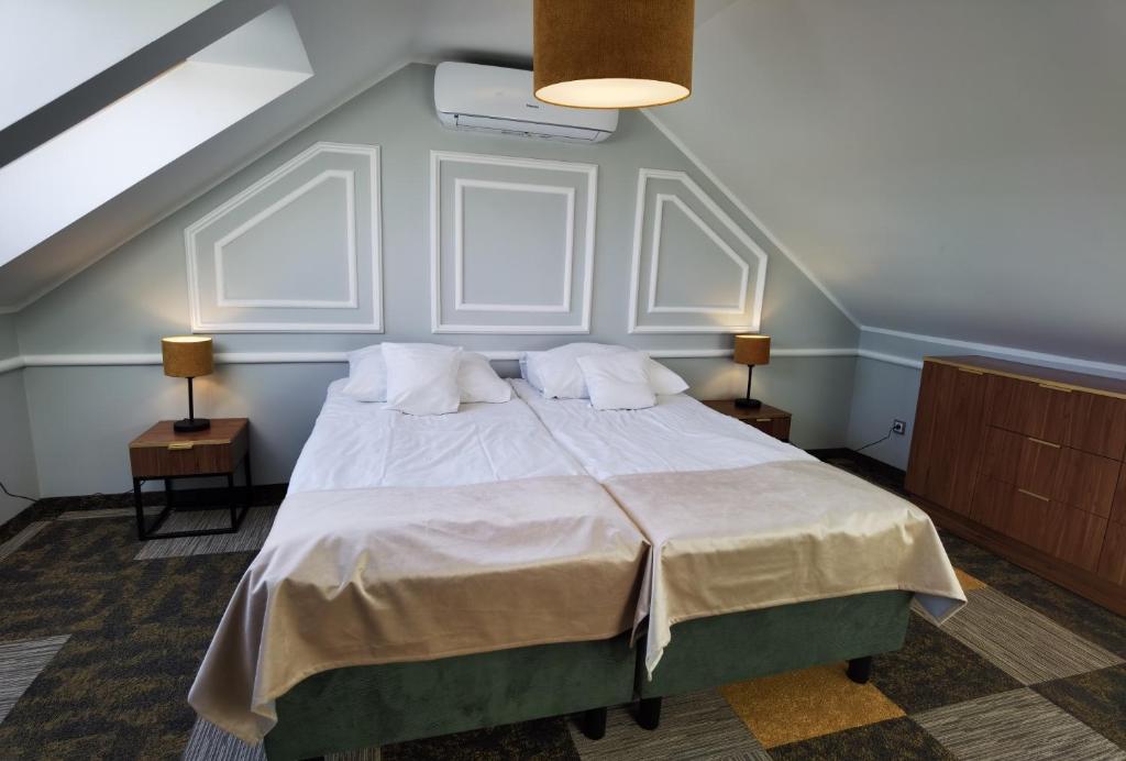 Posteľ alebo postele v izbe v ubytovaní Hotel Kormoran Resort & SPA