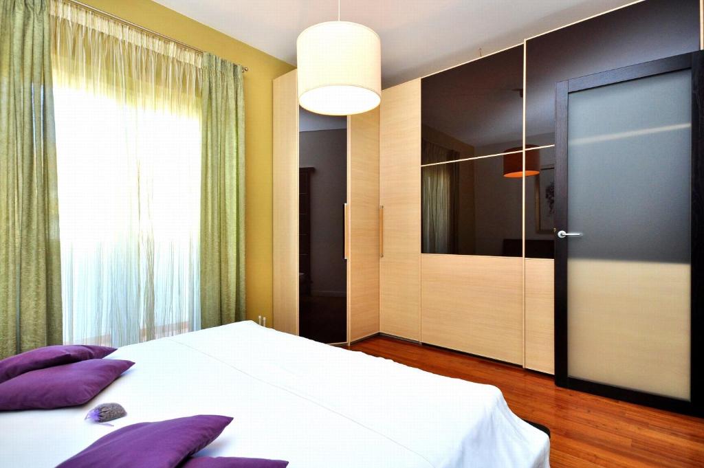 Posteľ alebo postele v izbe v ubytovaní Apartment SAKAL