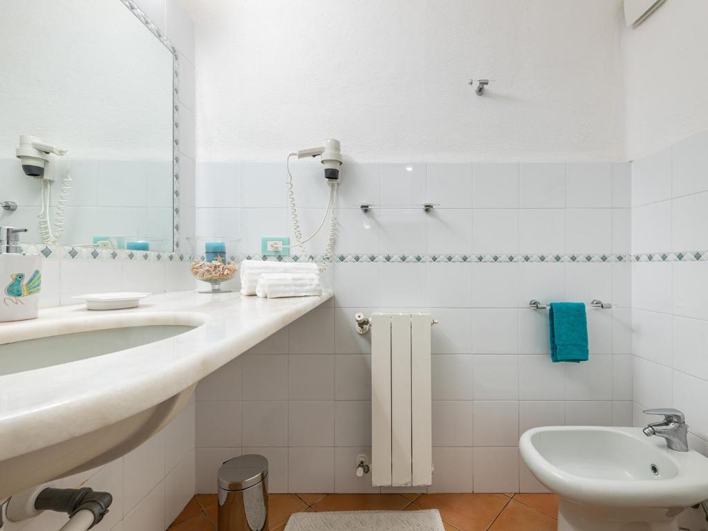 Koupelna v ubytování Relais Baia di Nelson