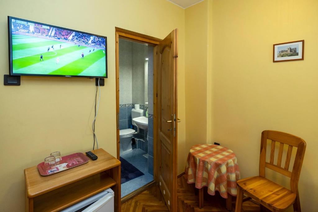 TV a/nebo společenská místnost v ubytování Cecey Vendégház
