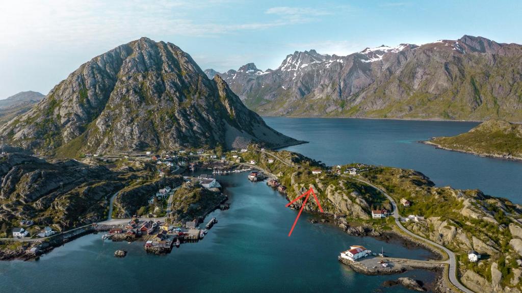 an aerial view of a small island in a body of water at Sundet Lofoten Holiday House in Sund