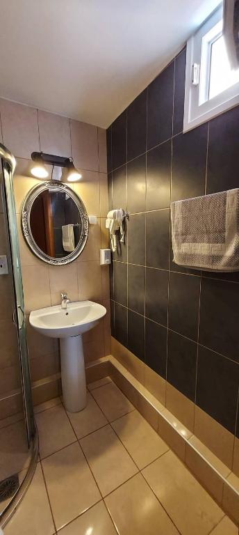 Koupelna v ubytování Hotel Epavli