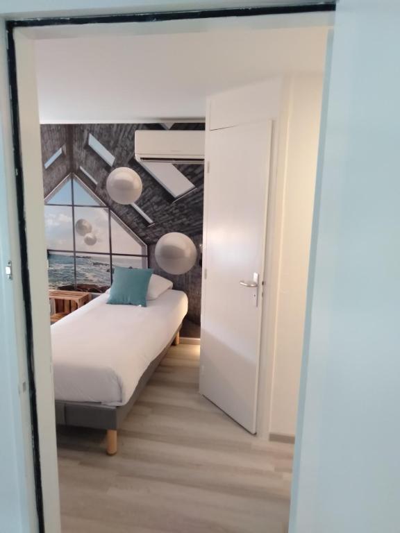 Postel nebo postele na pokoji v ubytování Urban Style Arl HOTEL
