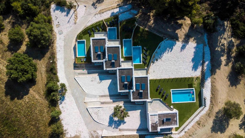 an aerial view of a house with a pool at The Euphoria Club Luxury Villas in Pefkochori