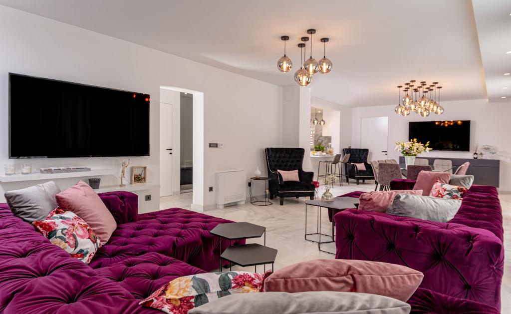 TV a/nebo společenská místnost v ubytování Palace Residence