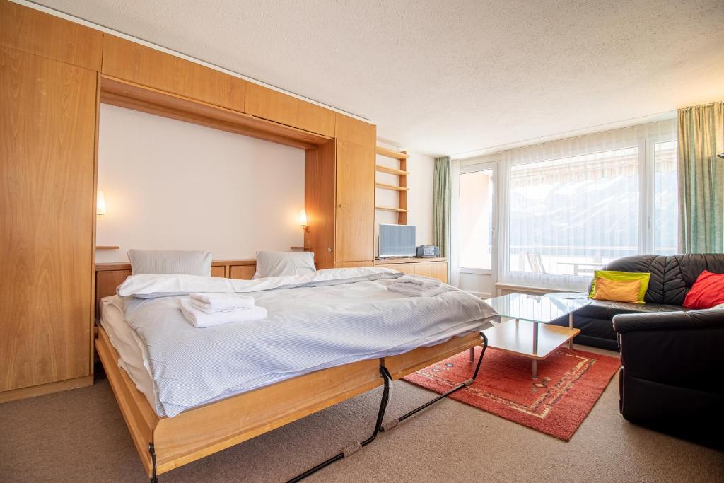 Postel nebo postele na pokoji v ubytování Utoring 412 by Arosa Holiday