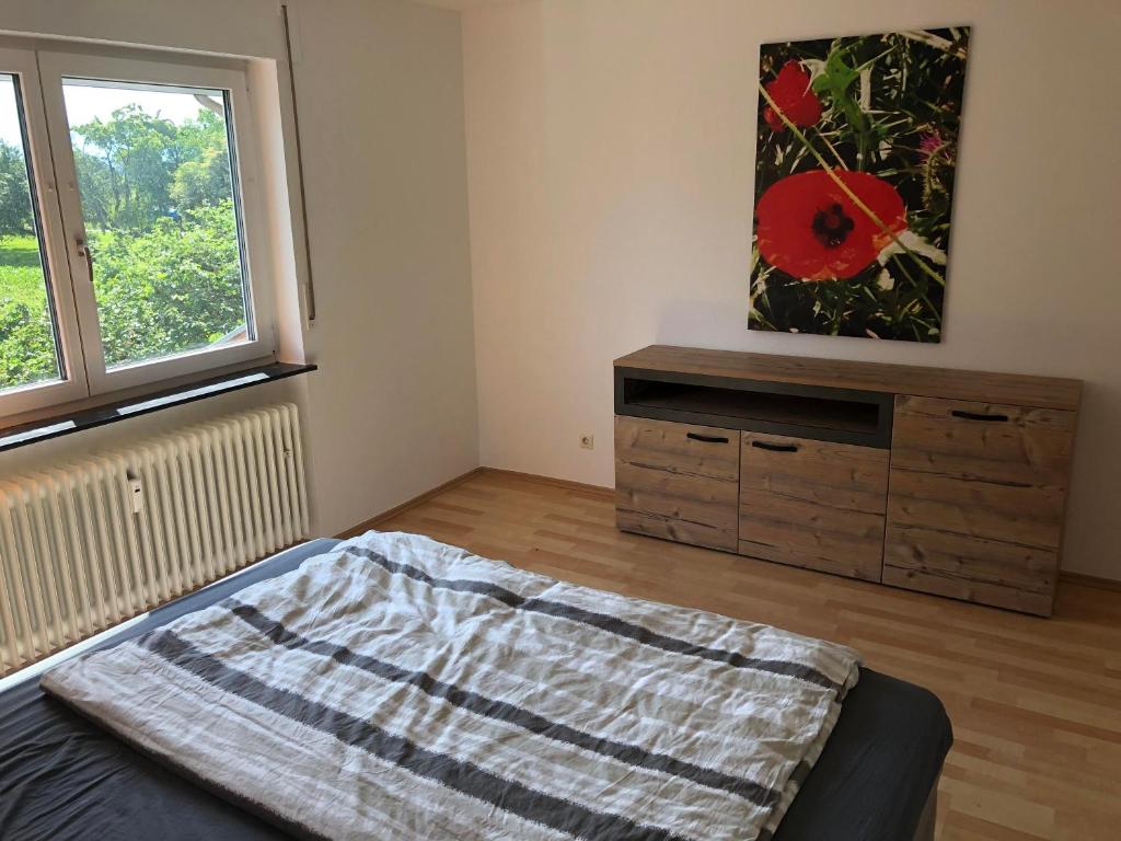 Postel nebo postele na pokoji v ubytování Haus Schwarzwaldblick
