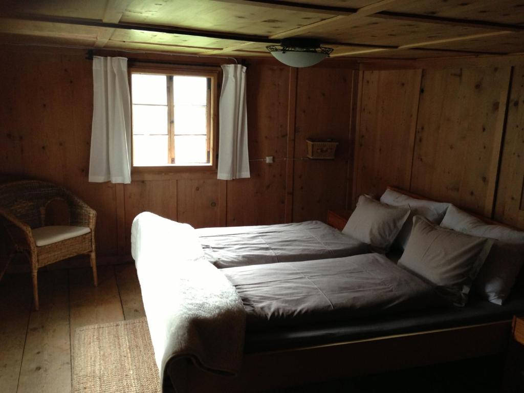 Giường trong phòng chung tại Ögghof 222