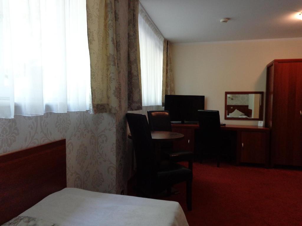 Posteľ alebo postele v izbe v ubytovaní Mazowsze Medi Spa
