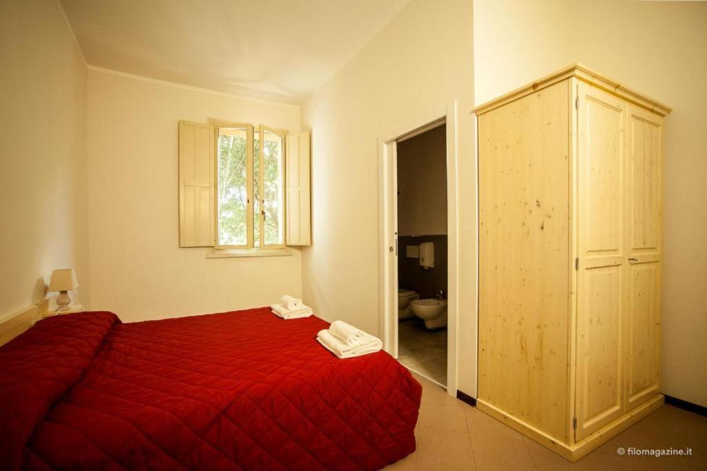 Postel nebo postele na pokoji v ubytování Student's Hostel Estense