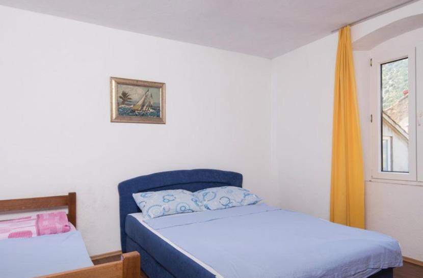 Postel nebo postele na pokoji v ubytování Kuca za odmor VUKIĆ
